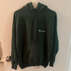 Champion woman’s medium Dark Green Hoodie